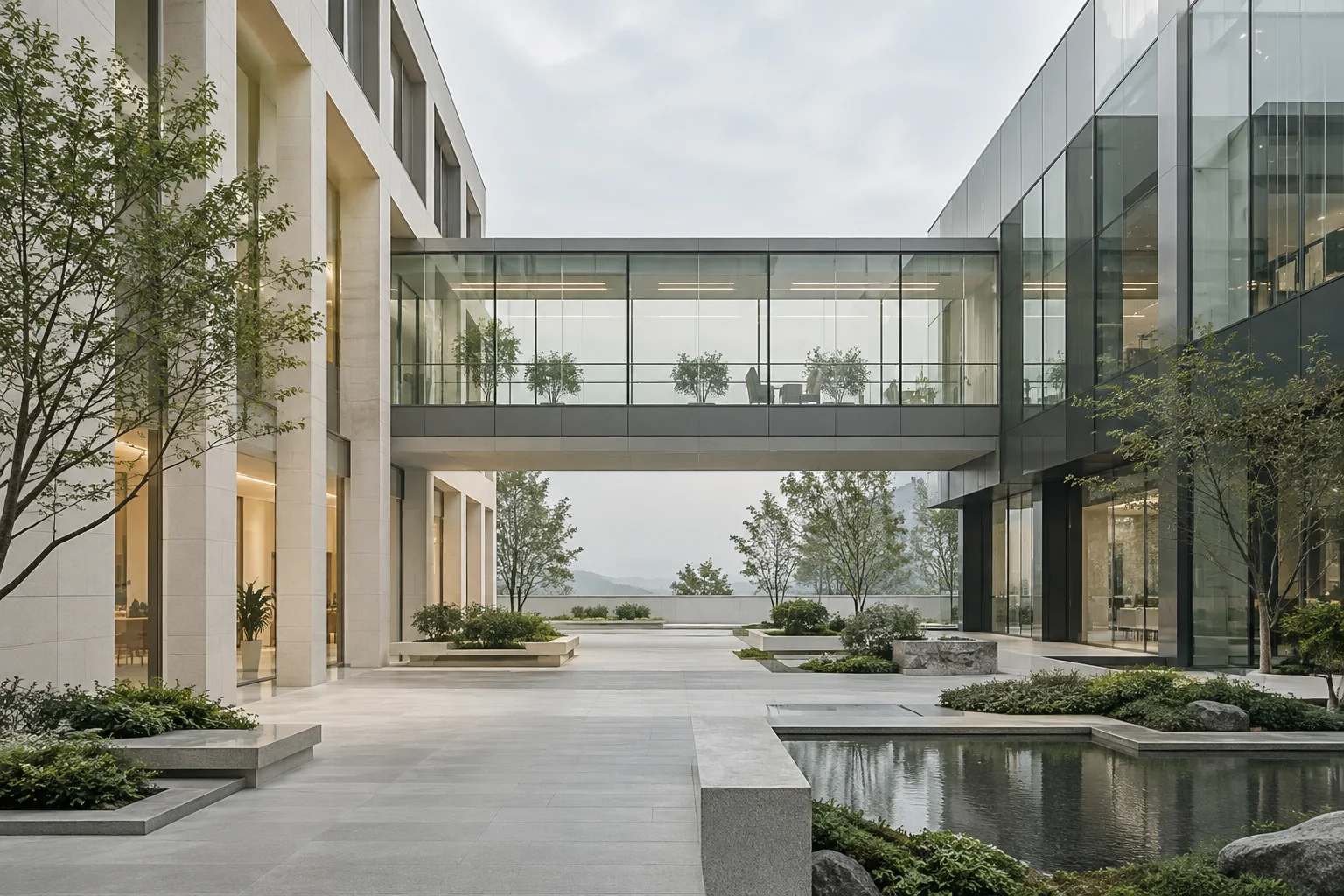 两翼不同材质的建筑通过通透廊桥相连,体量真实克制,以空间关系表达调整与协同