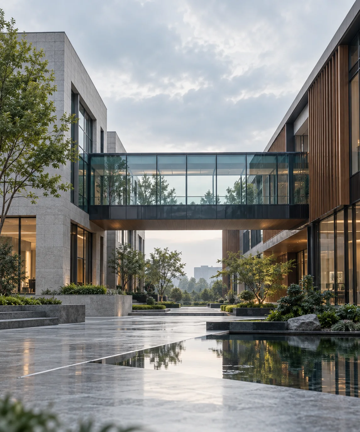 两翼不同材质的建筑通过通透廊桥相连,体量真实克制,以空间关系表达调整与协同