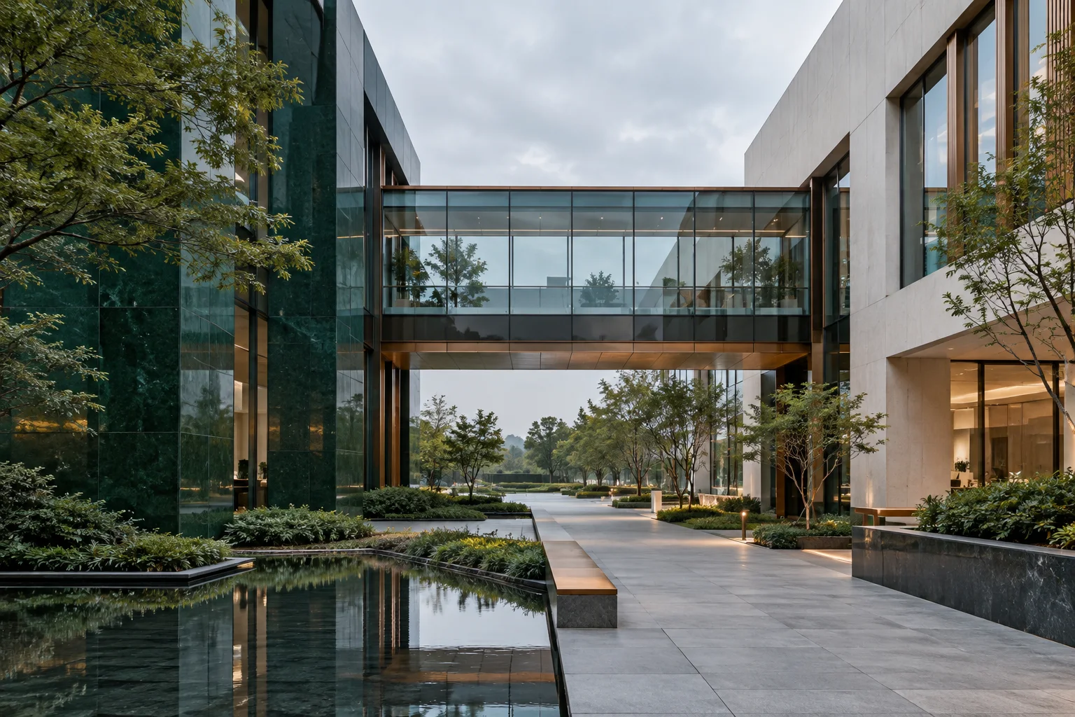 两翼不同材质的建筑通过通透廊桥相连,体量真实克制,以空间关系表达调整与协同