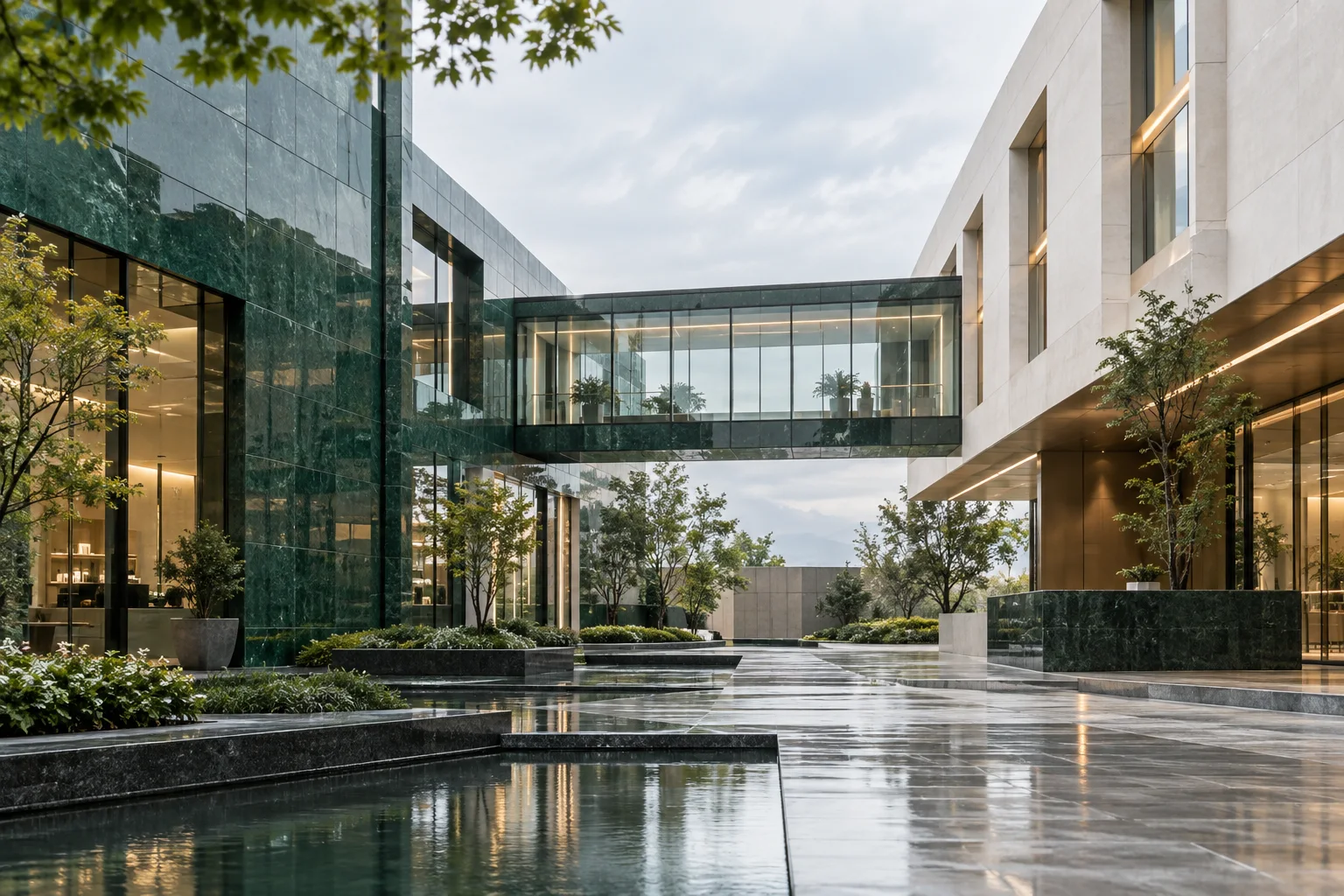 两翼不同材质的建筑通过通透廊桥相连,体量真实克制,以空间关系表达调整与协同