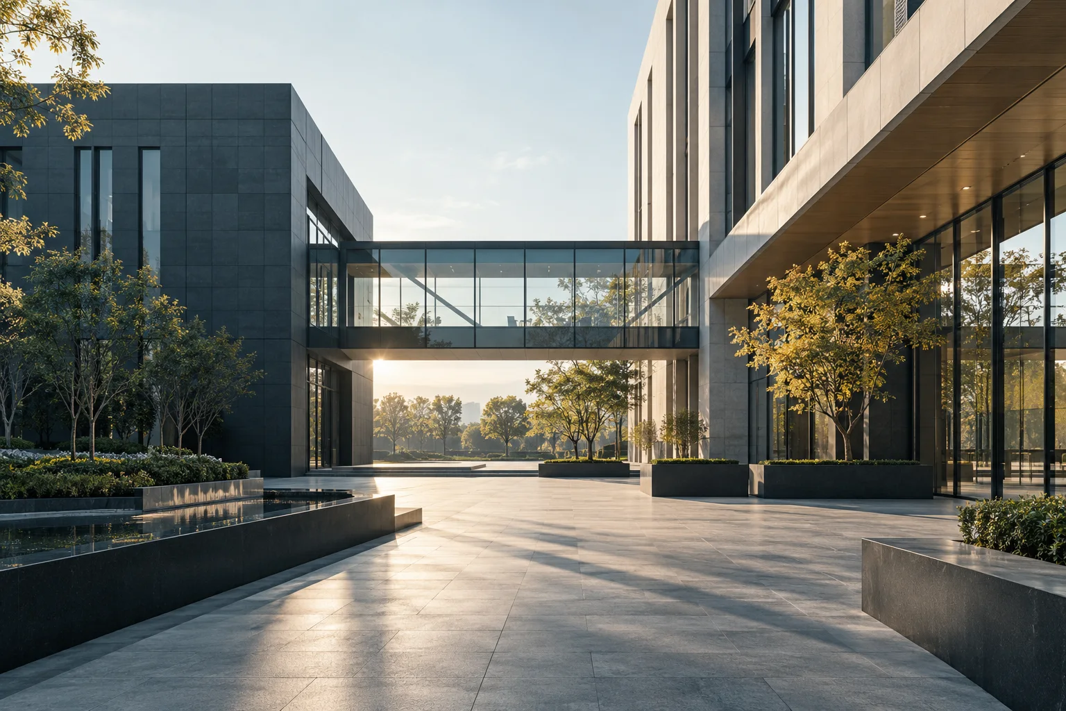 两翼不同材质的建筑通过通透廊桥相连,体量真实克制,以空间关系表达调整与协同