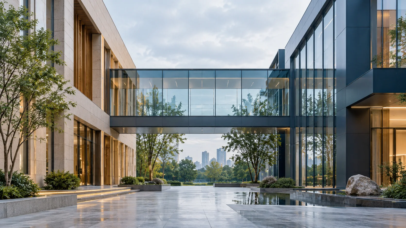 两翼不同材质的建筑通过通透廊桥相连,体量真实克制,以空间关系表达调整与协同