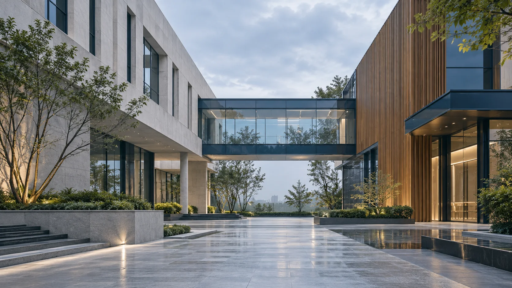 两翼不同材质的建筑通过通透廊桥相连,体量真实克制,以空间关系表达调整与协同