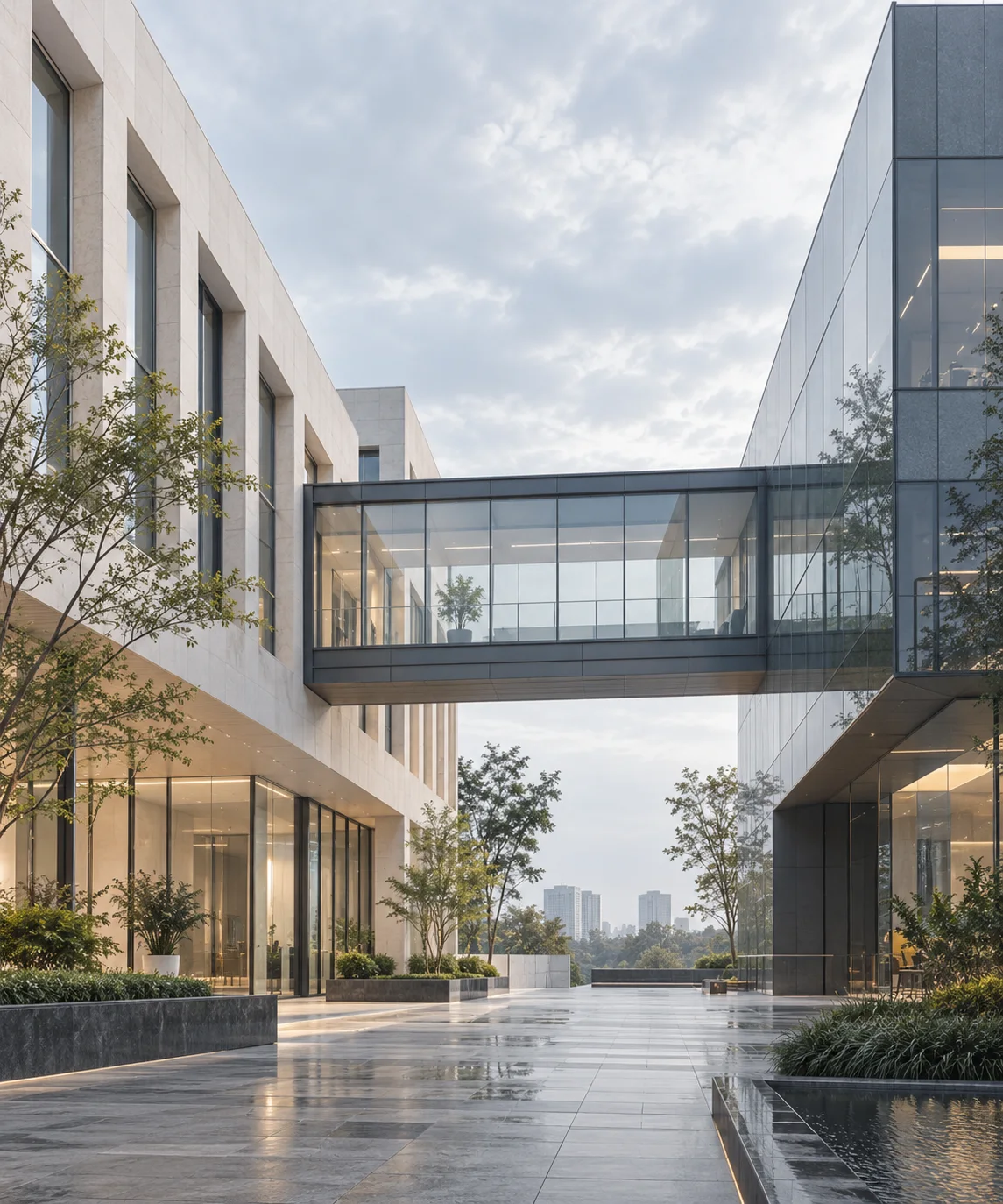 两翼不同材质的建筑通过通透廊桥相连，体量真实克制，以空间关系表达调整与协同